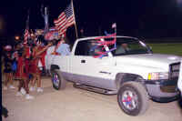 a010_10 scott moser pulling alumni float web.jpg (60563 bytes)